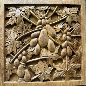 Handmade teak wood carving papaya trees